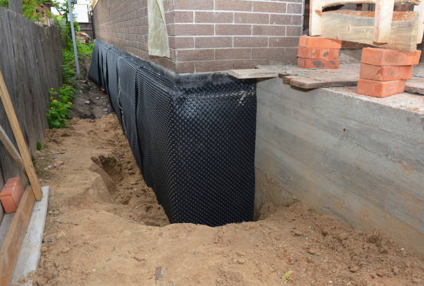 Happy homeowners after waterproofing job in Kewaskum